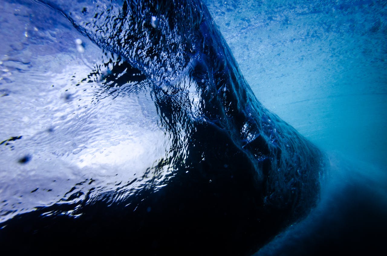 Captivating underwater view of ocean waves captured in Chile, revealing the beauty of motion and light.